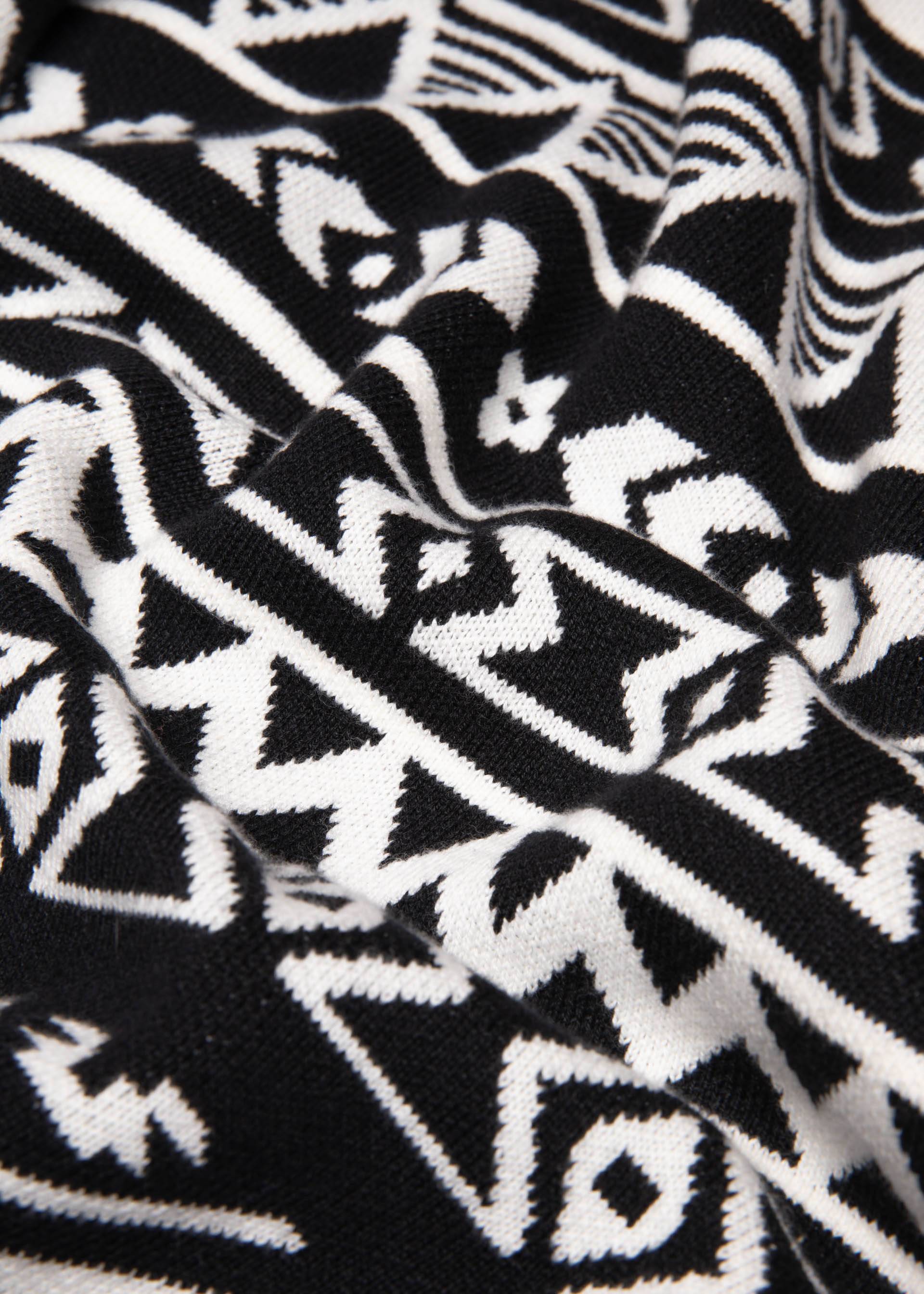 Strickpullover Cosy Storyteller, world traveller, Strickpullover, Schwarz